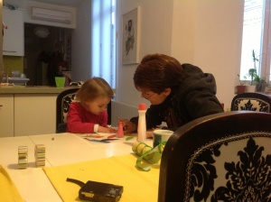Elsa and Grandma Pam painting each other's nails